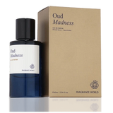 Флаконът и кутията на Fragrance World Oud Madness EDP 60 мл, показани заедно с леко отражение.