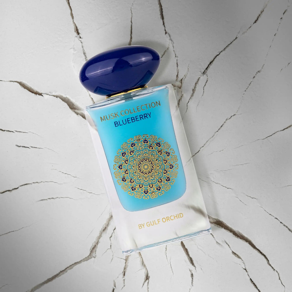 Gulf Orchid Blueberry EDP 60 мл – флакон върху мраморен фон