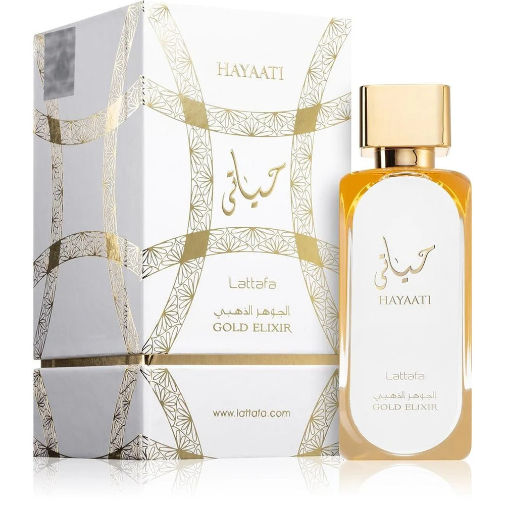 Флаконът и кутията на Lattafa Hayaati Gold Elixir EDP 100 мл, показани заедно с леко отражение.