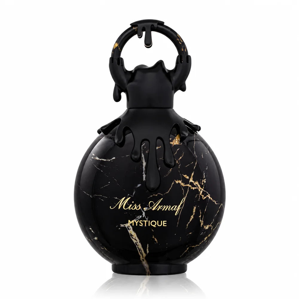 Флакон Miss Armaf Mystique EDP 100 мл с огледално отражение на бял фон.