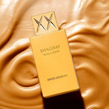 Swiss Arabian Shaghaf Vanilla Toffee EDP 75 мл – флакон върху златист плат